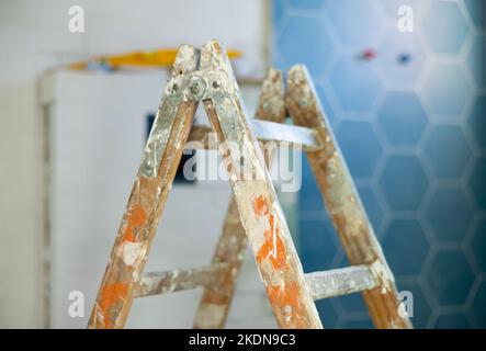 Stepladder in empty bathroom during improvement works Stock Photo