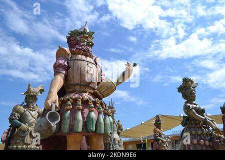 Statue of Enolo winemaker standing in a group of statues of The Food People by Dante Ferretti at the Expo Milano 2015. Stock Photo