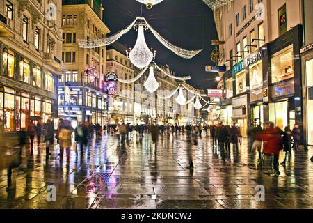 Vienna, Austria - November 26, 2010: : famous Graben street by night in Vienna, Austria. The Graben traces its origin back to the old Roman encampment Stock Photo
