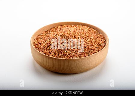 dried grains bird food. Red millet grain. Millets are a highly varied group of small-seeded grasses, widely grown around the world as cereal crops or Stock Photo