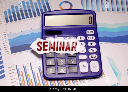 Hand writing Seminar topic on chalkboard. Stock Photo
