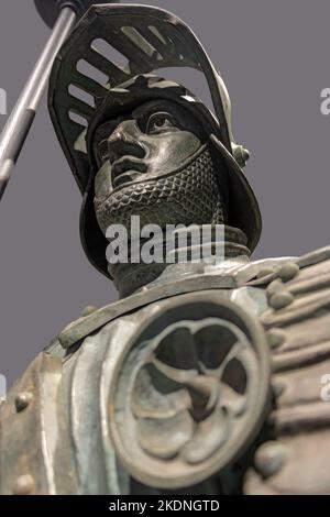 Metal statue of a medieval knight with armor Stock Photo