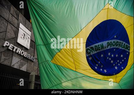 Brazilian flag at Petrobras oil company building headquarters. Brazil's national state-owned corporation in the petroleum industry Stock Photo