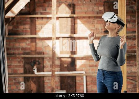 Virtual reality, metaverse and construction with a woman designer planning a home improvement with technology. Future, ai and 3d with a female Stock Photo