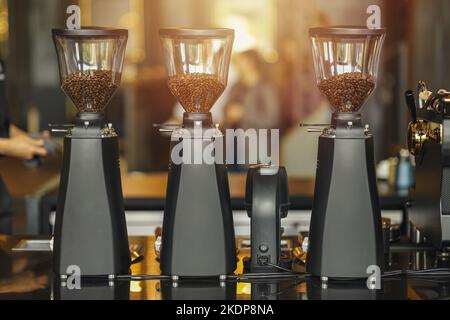 multiple coffee grinder machine for each type of coffee bean in specialty coffee cafe business Stock Photo