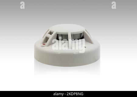 smoke detector or ceiling fire alarm detector home safety device isolated on white background with clipping path Stock Photo