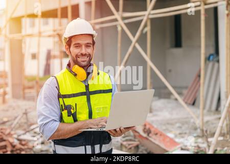 portrait happy builder foreman work in construction site. senior worker project designer leader concept. Stock Photo