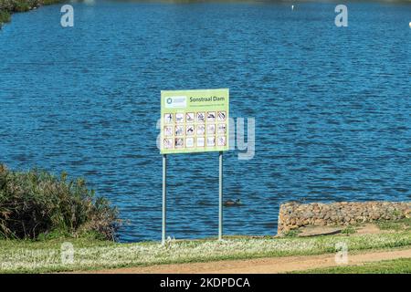 DURBANVILLE, SOUTH AFRICA - SEP 13, 2022: A view of Sonstraal dam in Durbanville in the Cape Town metroplitan area. An information board is visible Stock Photo