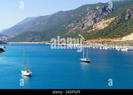 Yacht port in the Turkish city of Kas. Beautiful landscape with blue sea and yachts. Tourist attractions of Turkey and the Mediterranean. High quality photo Stock Photo