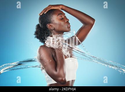 water splash, black woman and skincare health shower for cosmetic beauty, wellness and body cleaning. African american girl, luxury dermatology Stock Photo