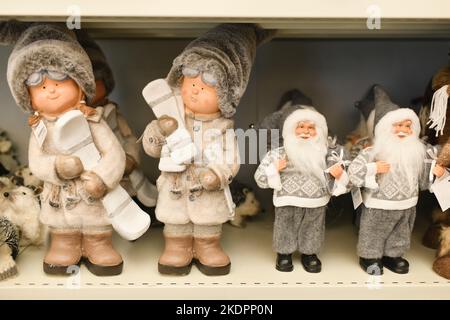 Ceramic figurines christmas toys are sold in the store Stock Photo