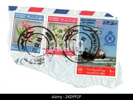 A montage of vintage postage stamps on paper from the Oman. Stock Photo