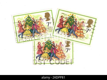 Vintage Christmas stamps from the United Kingdom on a white background. Stock Photo