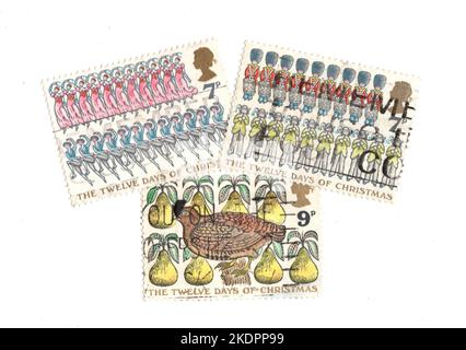 Vintage Christmas stamps from the United Kingdom on a white background. Stock Photo