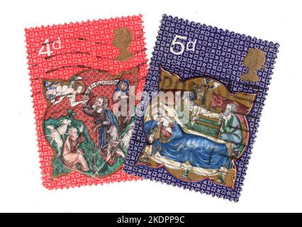 Vintage Christmas stamps from the United Kingdom on a white background. Stock Photo