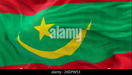 Close-up view of the Mauritania national flag waving in the wind. The Islamic Republic of Mauritania is a West African state. Fabric textured backgrou Stock Photo