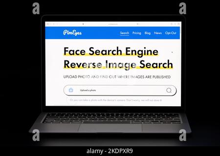 PimEyes face search engine page is seen on the laptop in a dark. Stafford, United Kingdom, November 8, 2022 Stock Photo