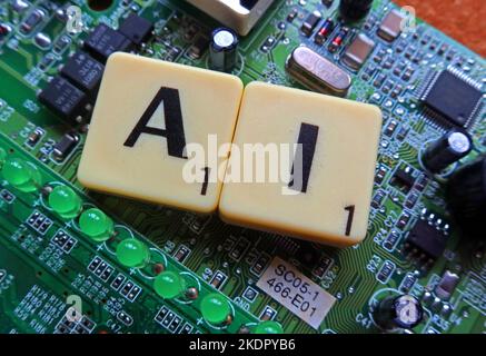 AI - artificial intelligence - Scrabble letters / word on a electronic PCB Stock Photo