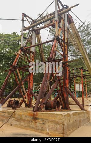 rusty iron supports full of rusty big ropes a starting place to slide to another place Stock Photo