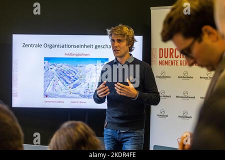 Todtnau, Germany. 08th Nov, 2022. Julian Probst, Managing Director of Feldbergbahnen, speaks while a table with prices for the coming winter season can be seen in the background. The dynamic pricing model of the lift association also provides for price increases for tickets purchased at short notice, but the operator did not name an upper limit when asked. The Feldberg lift association is presenting its plans for the 2022/23 winter season during a press conference today. Credit: Philipp von Ditfurth/dpa/Alamy Live News Stock Photo