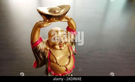 Laughing buddha idol from the top angle Stock Photo