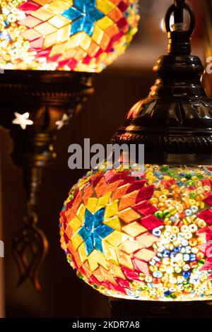 Traditional colourful Turkish lamps on sale at Bath Christmas market. Stock Photo