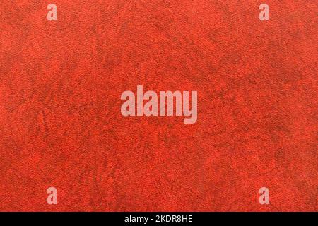 Red Artifical Leather Abstract Upholstery Pattern Texture Background Surface Vintage. Stock Photo