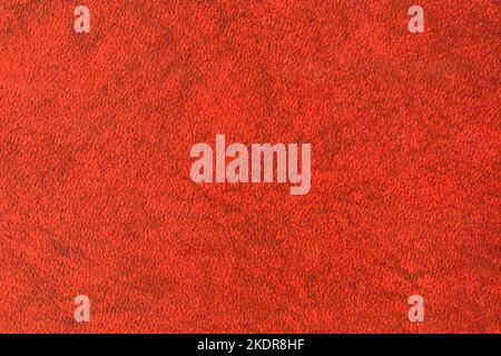 Red Artifical Leather Abstract Upholstery Pattern Texture Background Surface Vintage. Stock Photo