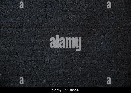 Black styrofoam backgraound and close up Stock Photo