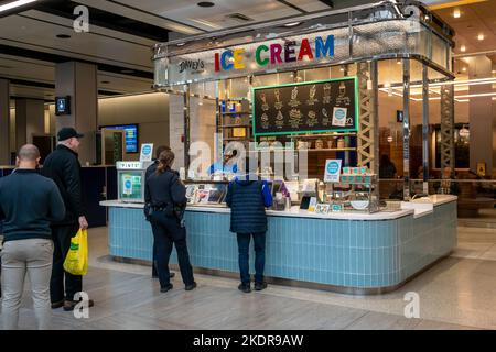 Free cones are the attraction at the grand opening of a branch of the Davey’s Ice Cream chain in the Moynihan Train Hall at Penn Station in New York on Friday, October 28, 2022. This is the third location for the local chain having stores in the East Village and in Greenpoint Brooklyn.(© Richard B. Levine) Stock Photo