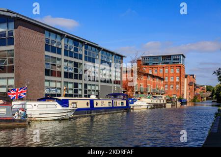 A collection of narrow boats and others in the Diglis Basin on the Worcester & Birmingham Canal, Worcestershire, England, UK Stock Photo