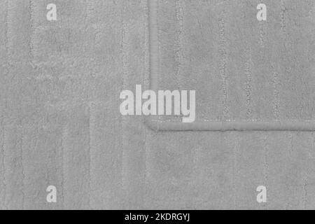 Carpet detail grey material floor fabric fragment for design part surface texture. Stock Photo