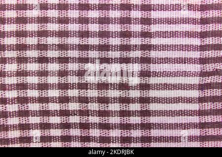 Plaid Abstract Pattern Fabric Picnic Tablecloth Vintage Gingham Background Checkered Texture Purple Violet Pink. Stock Photo