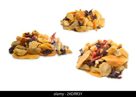 Mix of dried exotic fruit, mangos,slices of pineapples, passion fruit, papaya. Vegetarian dessert. Stock Photo