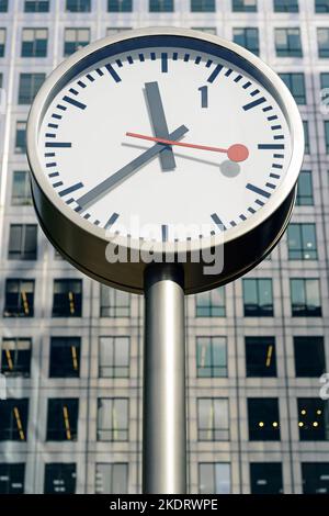 Canary Wharf Clock, One of Six Clocks Outside Canary Wharf Tower, Docklands, London, UK Stock Photo