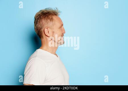 Wow Amazing Side View Of Astonished Man In Casual White Tshirt Standing  With Mouth Open In Surprise Stock Photo - Download Image Now - iStock