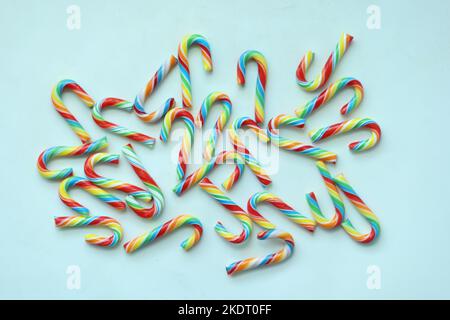 mini cherry candy canes on white background  Stock Photo