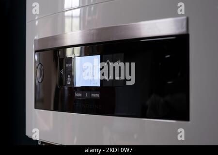 Control panel of an energy-efficient central heating gas boiler with display of water pressure, temperature and other settings Stock Photo