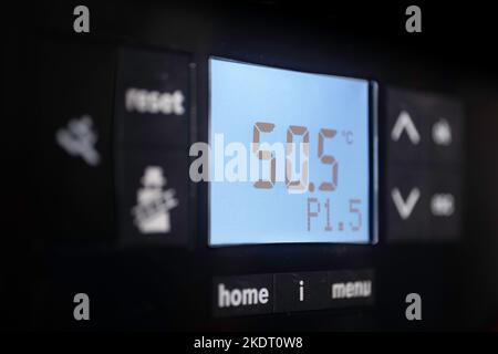 Detail of a control panel of an energy-efficient central heating gas boiler with display of water pressure, temperature and other settings Stock Photo