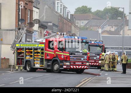 Stevenston, North Ayrshire, Scotland, UK Scottish Fire & Rescue in action as they enter a burning building in Ayrshire Stock Photo