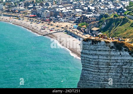 Etretat Normandy France. Tourists on top of the chalk cliffs Stock Photo