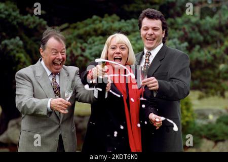 File photo dated 09/03/94 of Eastenders' stars (left to right) Bill Treacher, Wendy Richard and Michael French. Mr Treacher, who played Arthur Fowler in EastEnders, has died aged 92. The veteran actor was one of the BBC soap's original cast members and appeared from 1985 until 1996. He died late on Saturday night after suffering declining health for some time. Issue date: Tuesday November 8, 2022. Stock Photo