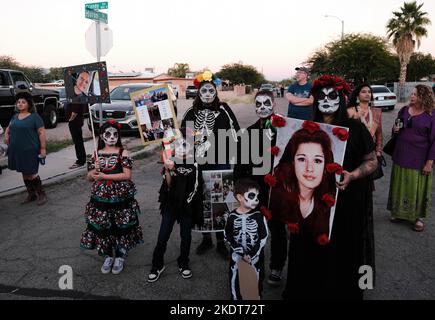 Tucson, Arizona, USA. 6th Nov, 2022. The 33rd annual All Souls Procession in Tucson, Arizona. Sponsored by the non profit Many Mouths To Feed hundreds of thousands of participants and spectators gather to remember and honor loved ones and friends who they have lost . They mourn their deaths and celebrate their lives keeping the deceased memories alive. People dress in ornate costumes similar to those seen at Day of the Dead but the two ceremonies are not the same. Marchers place written notes inside a large steel vessel called the Urn. Ushers take the notes and put them into the Urn which a Stock Photo