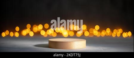 Cylinder wooden podium with Christmas bokeh lights Stock Photo