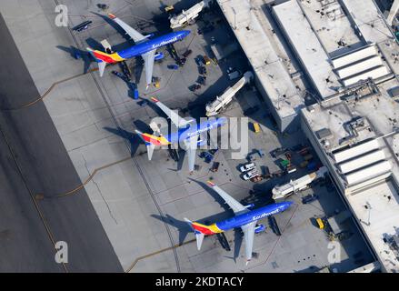 Southwest Airlines Terminal 1 at Los Angeles International Airport. Aerial view Southwest Airlines Boeing 737 aircraft lined up at LAX Airport T1. Stock Photo