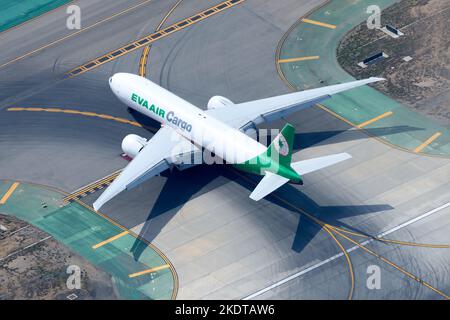EVA Air Cargo Boeing 777 aircraft taxiing. Plane 777F of Evergreen Airways used for freighter transport. Cargo airplane of EVA Air Cargo. Stock Photo