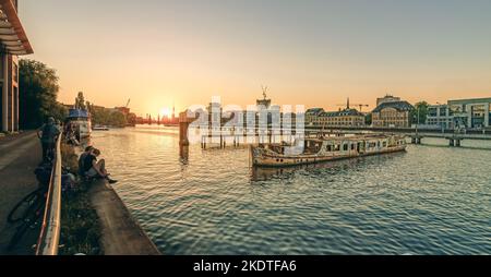 Berlin skyline during sunset with a view of the Oberbaum Bridge and the TV Tower Stock Photo