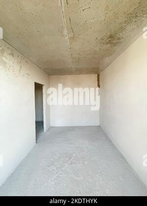 Interior of the apartment without decoration in gray colors Stock Photo