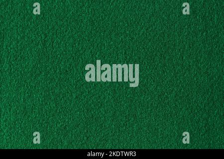Green color felt textile fabric material texture background. Abstract monochrome dark blue color felt background Stock Photo