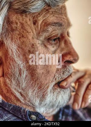 Side photo of an elderly man's face Stock Photo